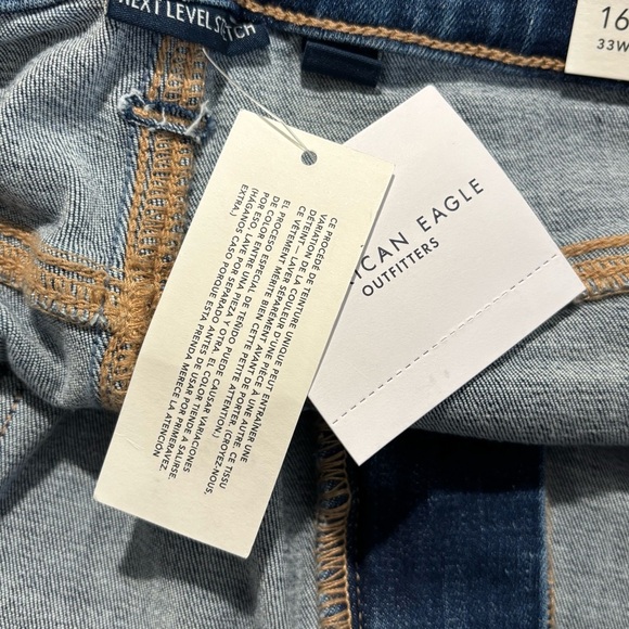 AMERICAN EAGLE Sz 16S Super High Rise Flare Distressed Hem Mid-Wash Jeans NEW - Picture 11 of 13